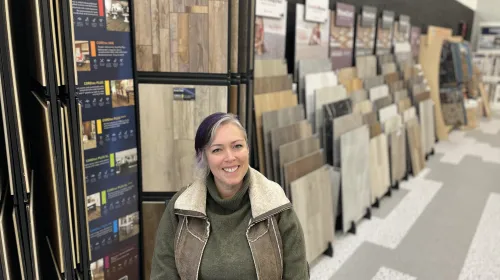 Melinda Nearhoof presents flooring designs in their store